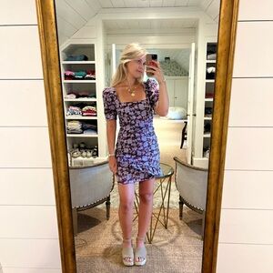 Likely floral ruched mini dress in size 2. Only worn once and originally $248